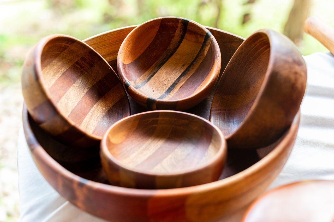 services-04 A collection of artisanal wooden bowls on display, showcasing natural craftsmanship.